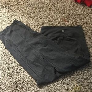 lululemon athletica women Black with lines Pants. size 2?